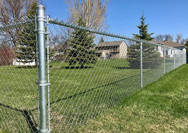 What is the difference between the chain link fence used on the highway?